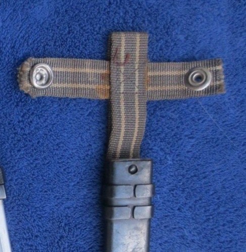 East German AK47 Bayonet and scabbard with striped hanger and chipped grip 5.jpg